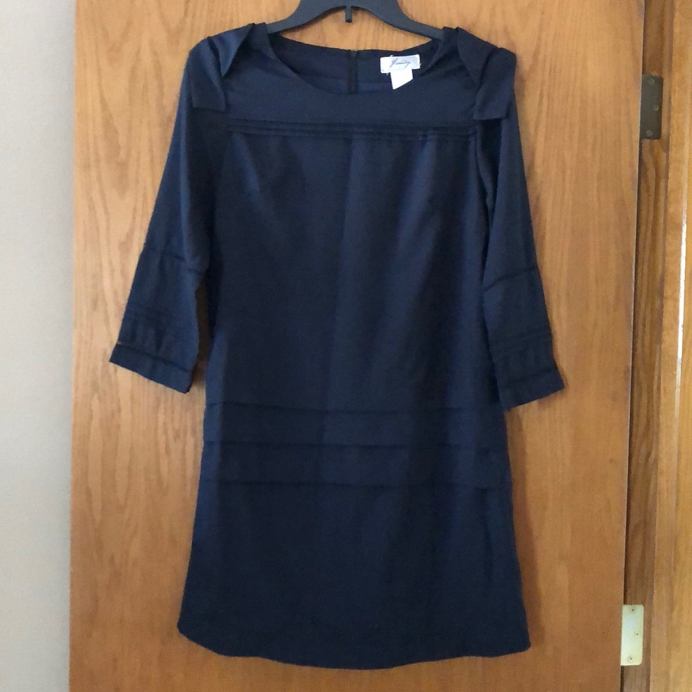 Navy dress with 3/4 length sleeves.